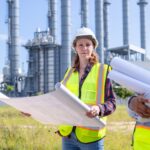 Female Engineers Overseeing Industrial Plant Construction